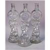 Image 6 : A GROUP OF COLORLESS GLASS FIGURAL BOTTLES