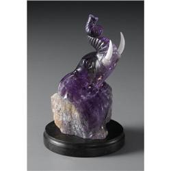 CHINESE CARVED AMETHYST FIGURE OF AN ELEPHANT