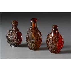 SET OF CHINESE CARVED AMBERINE SNUFF BOTTLES