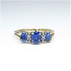 Vivid Blue Tanzanite and Diamond Ring