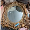 Image 1 : Ornate gold mirror from the show