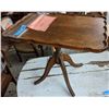 Image 1 : Barbers shop table from scene. Wooden table approx 2 feet high the 1930's end table
