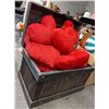 Image 2 : Weathered wooden chest with stuffed heart cushions