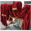 Image 1 : Rolling racks with red curtains