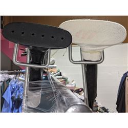 Rack of ironing board with stands hangers extenders steamers and misguidance