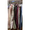 Image 8 : Half rack of clothing with a rolling rack