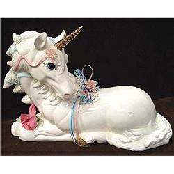 White glazed Unicorn with golden horn a