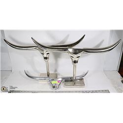 GROUP OF THREE SILVER LONGHORN STATUES