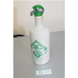 SASKATCHEWAN ROUGHTRIDERS / HUDSON BAY CO POTTERY WHISKEY BOTTLE