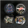 Image 1 : AUTOGRAPHED HOCKEY PUCK LOT (PEARSON, SCHNEIDER, KINDIL, DAFOE)