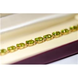 14 KT GOLD AND PERIDOT BRACELET 7.5"