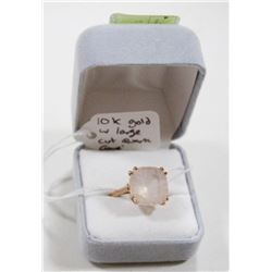 10 KT GOLD RING WITH LARGE CUT ROSE QUARTZ