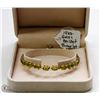 Image 1 : 14 KT GOLD AND PERIDOT BRACELET 7.5"
