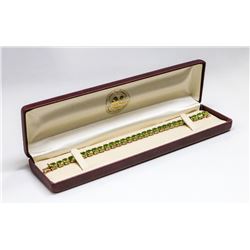 14 KT GOLD AND PERIDOT BRACELET 7”
