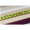 Image 2 : 14 KT GOLD AND PERIDOT BRACELET 7”