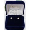 Image 1 : .20 TCW DIAMOND EARRINGS ON 14 KT WG STUDS