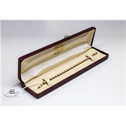  10K GOLD BRACELET WITH OPALS 7”