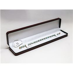 14 KT GOLD BRACELET WITH AQUA MARINES 7.5”