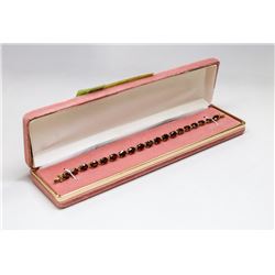 14 KT GOLD AND GARNET BRACELET 7.5”