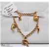 Image 1 : UN AERRA 9KT GOLD EGYPT CHARM BRACELET 7"