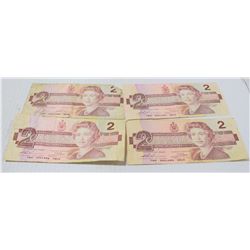 FOUR ASSORTED CANADIAN $2 BILLS