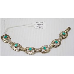 STERLING SILVER AND TURQUOISE COLOURED STONE