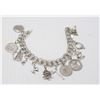 Image 1 : STERLING SILVER CHARM BRACELET 36G 7.5”