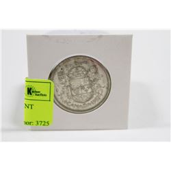 1957 CANADIAN SILVER 50 CENT PIECE IN HOLDER