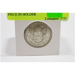 1957 CANADIAN SILVER 50 CENT PIECE IN HOLDER
