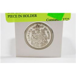 1963 CANADIAN SILVER 50 CENT PIECE IN HOLDER