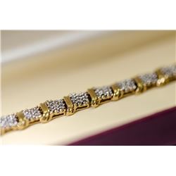 APPRAISED @ $3000.00 14KT YELLOW AND WHITE GOLD DIAMOND BRACELET.