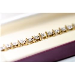 APPRAISED @ $1800.00 10KT YELLOW AND WHITE GOLD DIAMOND BRACELET.
