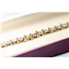 Image 1 : APPRAISED @ $1800.00 10KT YELLOW AND WHITE GOLD DIAMOND BRACELET.