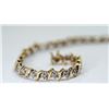 Image 2 : APPRAISED @ $1800.00 10KT YELLOW AND WHITE GOLD DIAMOND BRACELET.