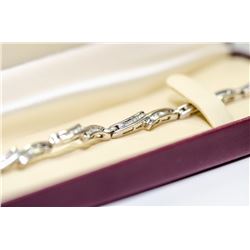 APPRAISED @ $1800.00 10KT WHITE GOLD FANCY CUT DIAMOND BRACELET.