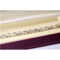 APPRAISED @ $1400.00 10KT WHITE GOLD DIAMOND SET BRACELET.