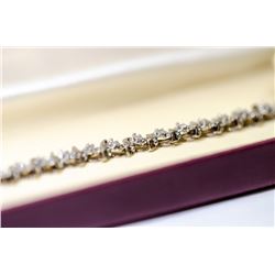 APPRAISED @ $1800.00 10KT WHITE GOLD DIAMOND SET BRACELET.