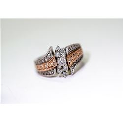 APPRAISED @ $2600.00 14KT WHITE AND ROSE GOLD DIAMOND RING. SIZE 6.5
