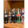 Image 2 : Large Lot Of Over 20 Coca-Cola Vintage Bottles, Mostly Full