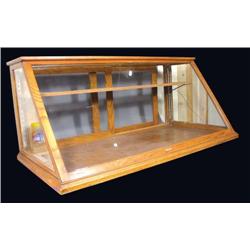 Duluth Slant Front Oak Showcase