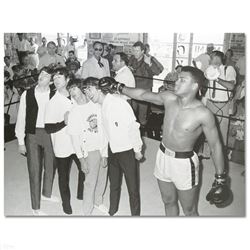 "Muhammad Ali Punching The Beatles" Licensed Photograph of Heavyweight Champ Muh