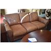 Image 1 : Full sized distressed light brown leather sofa