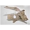 Image 1 : Whale vertebrae carving of three swimming figures, no signature found 12" in length
