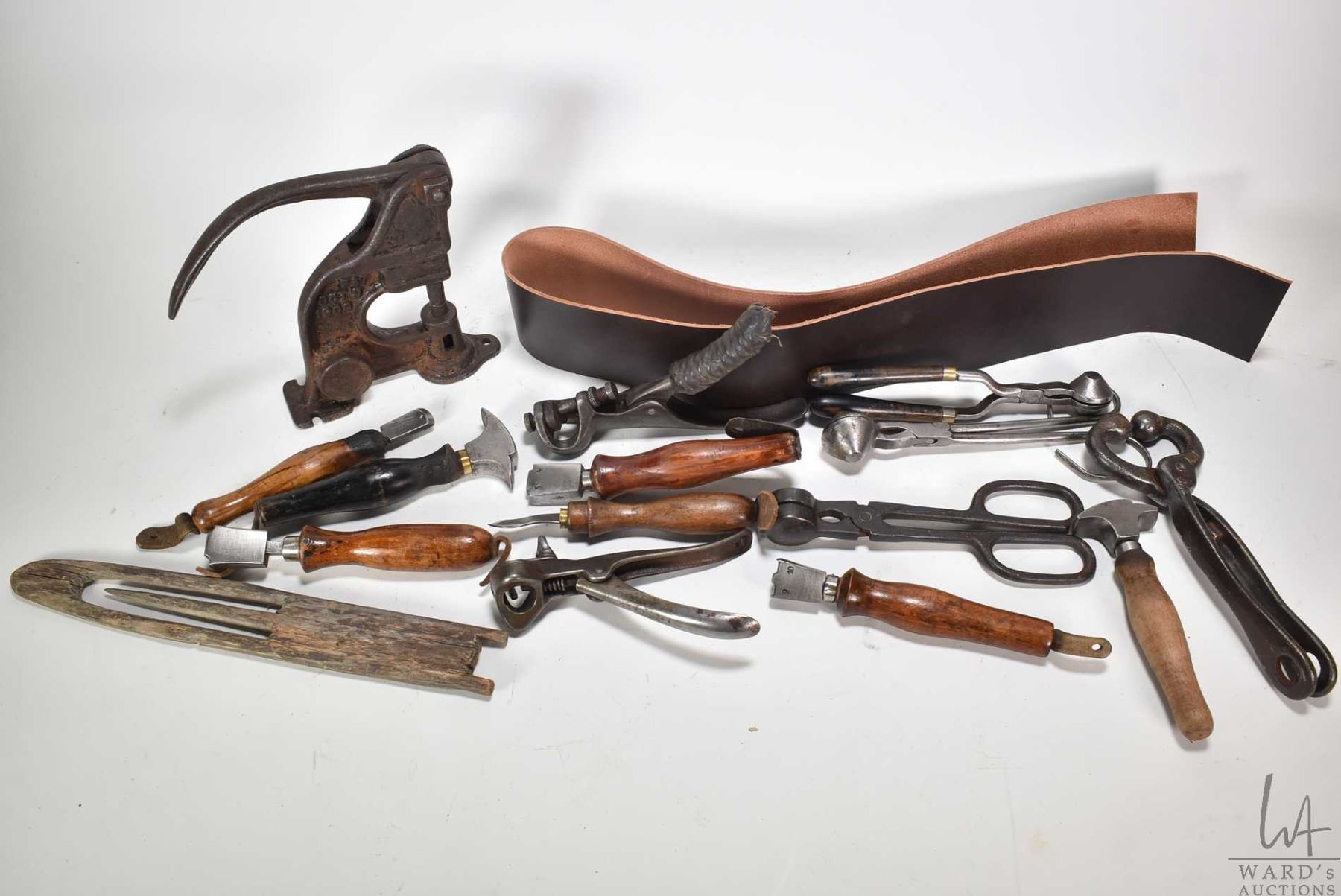 Selection of vintage and new leather working tools including rivet ...
