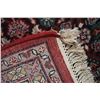 Image 3 : 100% wool area carpet with center medallion, red background and overall geometric floral design with