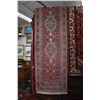 Image 1 : Wool carpet runner with multiple medallions, red background and overall floral design and highlights