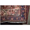 Image 2 : 100% handmade Mir area carpet with overall geometric design, red background and multiple borders in 