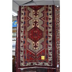 100% handmade wool carpet runner Sarab with red background and highlights of blues, cream, tan etc. 