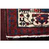 Image 2 : 100% handmade wool carpet runner Sarab with red background and highlights of blues, cream, tan etc. 