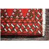 Image 2 : 100% handmade wool scatter rug with red background, overall geometric design and highlights of cream